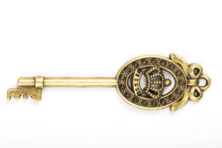 Single vintage key with isolated with white background.
