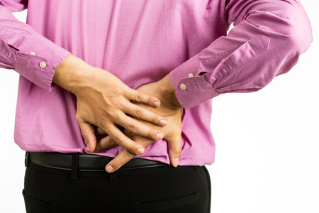 Back pain man with white background.