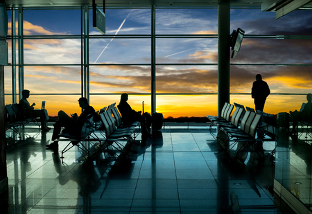 Airport terminal ,passenger wait for transportation with silhouette concept.の写真素材