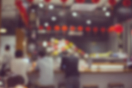 Blurred coffee shop background for your design.の写真素材