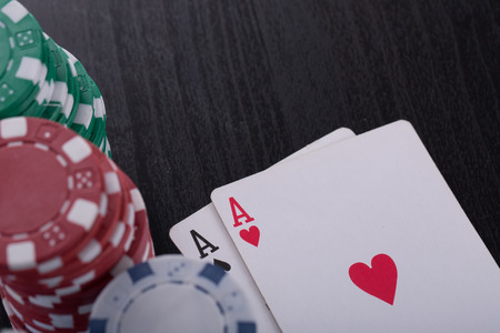 Poker chips for casino game on the table.