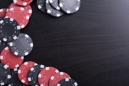 Poker chips for casino game on the table.の写真素材