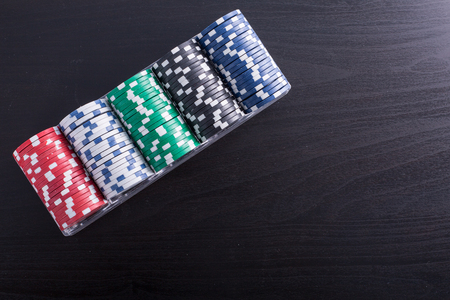 Poker chips for casino game on the table.の写真素材
