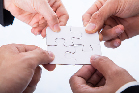 Jigsaw puzzle piece ,complete your mission with white backgroundの写真素材