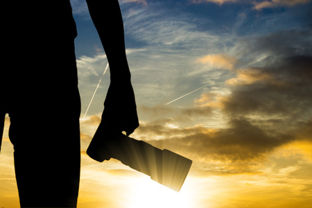 Camera photographer holding DSLR for preparing to phtography travel in twilight time.の写真素材