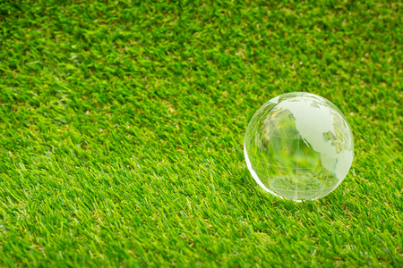 Global businesss finance on the grassの写真素材