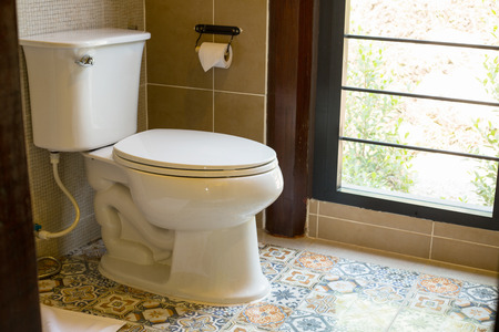 White toilet bowl in the bathroom.の写真素材