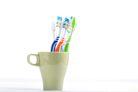 Toothbrush colorful healthy dental isolated with white background.の写真素材