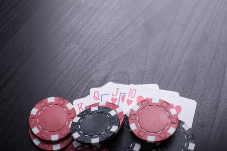 Poker chips for casino game on the table.
