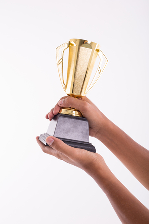 Award Trophy for winner achievement isolated with white background.の写真素材