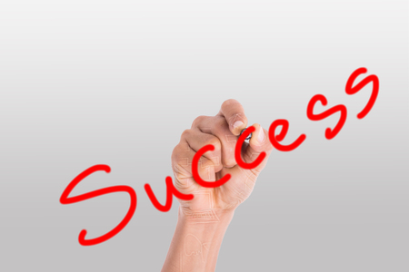 Writing text success with your hand.の写真素材