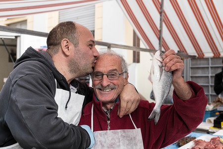 Milan ,ITALY - October 29 ,2017:Italian fishmonger looking to camera and smile in fresh supermarket ,Milan Italy.のeditorial素材