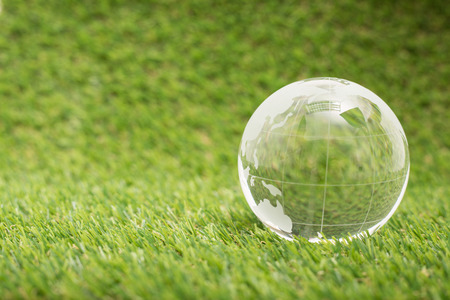 Global businesss finance on the grassの写真素材