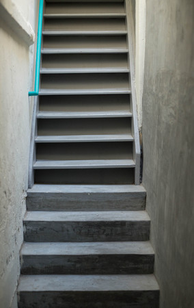 Vintage of staircase for going up to upper building.の写真素材