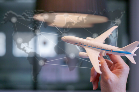 Holding airplane for transport around the world concept.