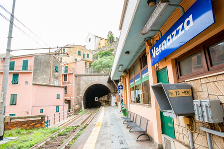 CINQUE TERRE ,ITALY - OCTOBER 24 ,2016: Passeger waiting train in Vernazza station for go to other station.のeditorial素材