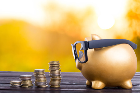 Piggy bank money with stack coins save your finance.