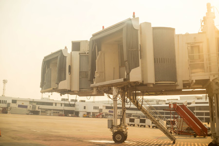Airport terminal gate for passeger walk inside Aircraft in the afternoon.の写真素材
