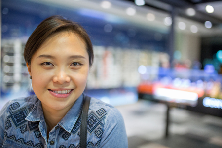 Asian woman walking in Department store. Shopping time.の写真素材