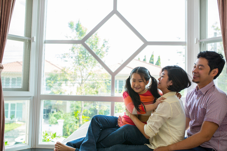 Asian family happy portrait at home.の写真素材