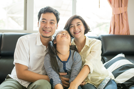 Asian family happy portrait at home.の写真素材