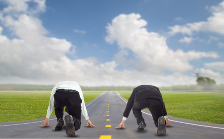 Competition businessman challenge and battle for run to the target on the start positionの写真素材