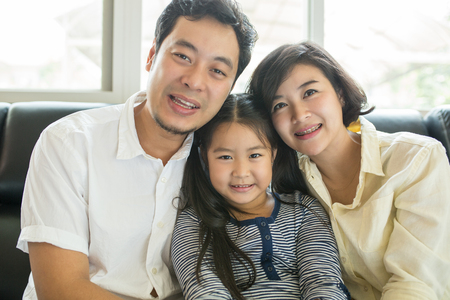 Asian family happy in living room.の写真素材