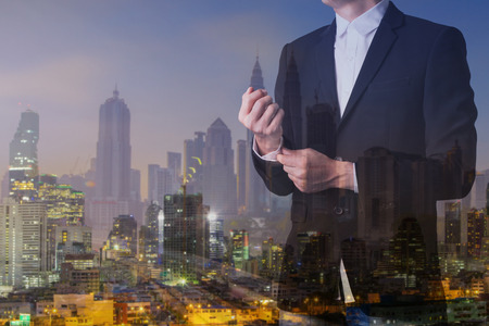 Businessman with casual suit with double exposure in the office.の写真素材