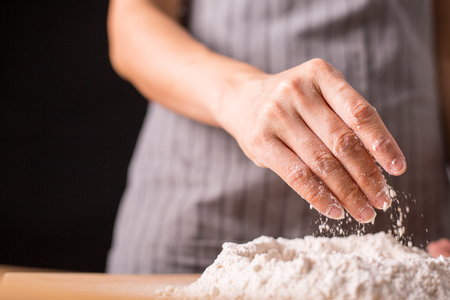 Kneading dough prepare for breafast food in the kitchen room.の写真素材