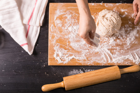 Kneading dough prepare for breafast food in the kitchen room.の写真素材