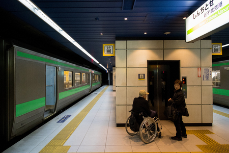 SAPPORO,HOKKAIDO - January 14 ,2016 :Passeger waiting lift for go up to main station in Sapporo train station in Hokkaido Japan.のeditorial素材