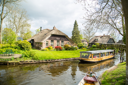 GIETHOORN,NETHERLANDS - April 22 ,2017: Giethoorn village house traditional ,Venice of Netherlandsのeditorial素材