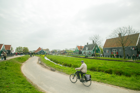 Natherland,Zaanse Schans - April 21,2017 : Windwill traditional for agriculture and tourist people visit this landamrk in Natherland.のeditorial素材