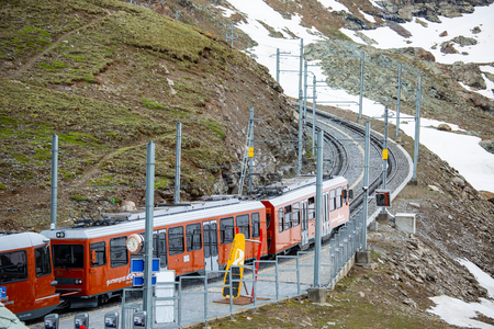 Zermatt ,Switzerlands - June 11 ,2018 : Gornergrat bahn the matterhorn railway red train for bring tourist people to veiw pointのeditorial素材