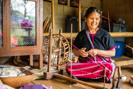 CHIANGMAI,THAILAND-August  7,2018: Native Asian people sewing cloth sheep with manual machine in Chiang Mai ,Thailand.のeditorial素材