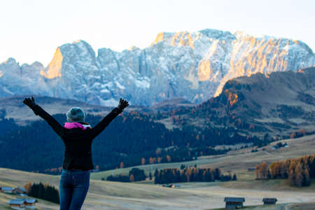 A woman happiness after arrived landmarks of natural Bolzano ,Italy.Travel photo nature of landscape.の写真素材