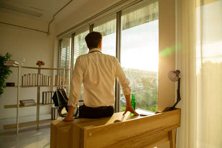 Stressed and worried about his project and job in the office.After can not find solution officer so sadly.の写真素材