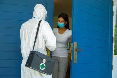 PPE staff medical team visiting for check  patient coronavirus after shutdown area for visit and...
