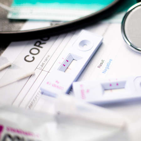 Rapid Antigen Test kit for check coronavirus result is negative result with report document.Covid-19 Ag with nasal rapid test.Healthy fast checking virus disease infection.の写真素材