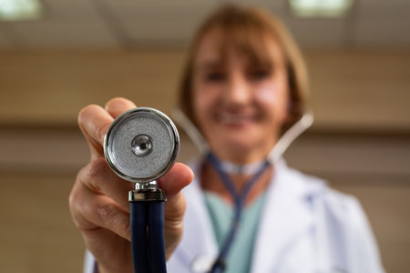 Medicare doctor holding stethoscope for support patient person in hospital.の写真素材