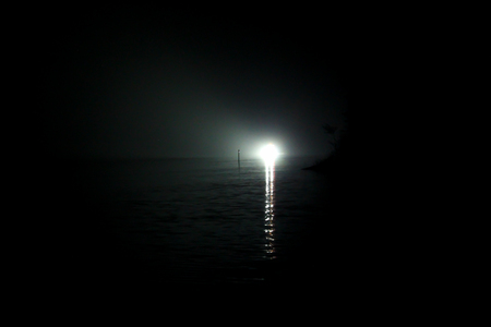 A search and rescue unit lighting up the sea in search of the objectの写真素材