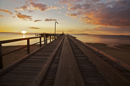 Sunset on the Dock at Fraser Island, Australiaの写真素材