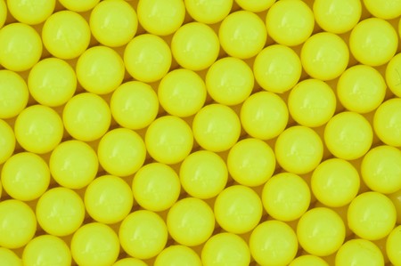 yellow plastic ball backgroundの写真素材