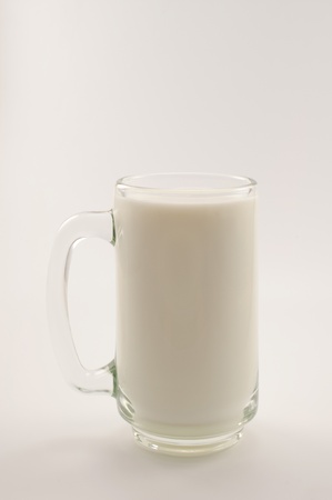 glass of milk on white backgroundの写真素材