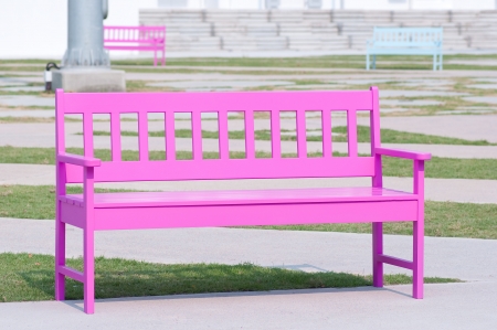 pink street chair in the parkの写真素材