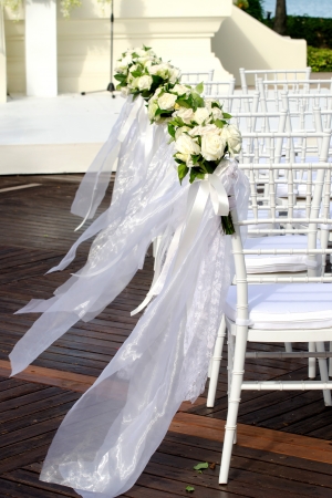 white Wedding Chairs with beautiful flowerの写真素材
