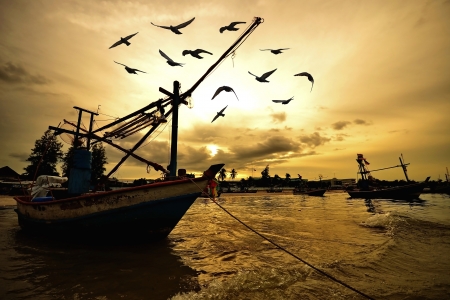 small fishing boats in the sea near Hua Hin fishing port,Thailand