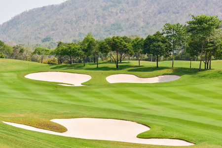 Sand bunkers on the golf courseの写真素材