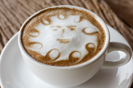 a cup of vintage coffee on the old wood backgroundの写真素材