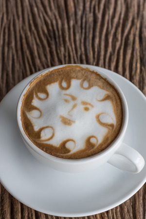 a cup of vintage coffee on the old wood backgroundの写真素材